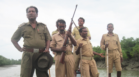 Deputy Ranger Uttam Biswas and his team of 8 forest guards / ©: WWF-India rel=