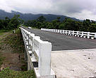 Elevated section of NH 152 with an underpass.